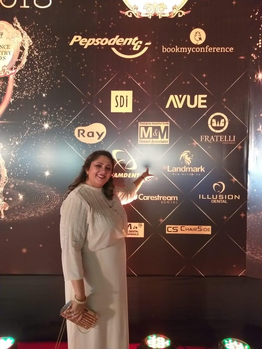 Famdent_awards_maala_Mam.jpg